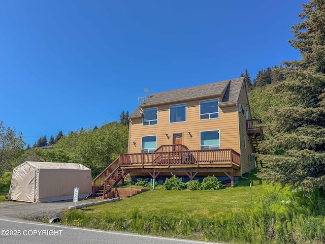 124 Mountain View Dr, Homer, AK 99603 - back of house with a lawn and a deck