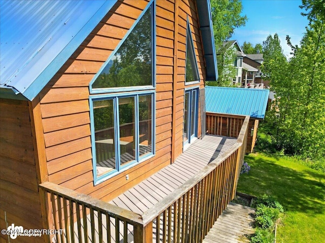 5680 W Birch Harbor Dr, Wasilla, AK 99623 - view of property exterior with a lawn and metal roof