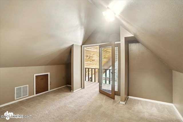 5680 W Birch Harbor Dr, Wasilla, AK 99623 - additional living space featuring carpet flooring, lofted ceiling, and baseboards