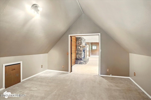 5680 W Birch Harbor Dr, Wasilla, AK 99623 - bonus room with carpet flooring, lofted ceiling, and baseboards