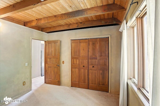 5680 W Birch Harbor Dr, Wasilla, AK 99623 - unfurnished bedroom with carpet, wooden ceiling with exposed beams, multiple windows, and a closet