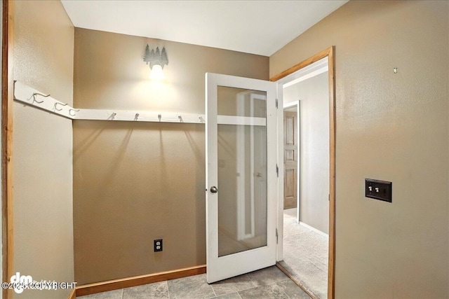 5680 W Birch Harbor Dr, Wasilla, AK 99623 - mudroom featuring baseboards and tile patterned floors