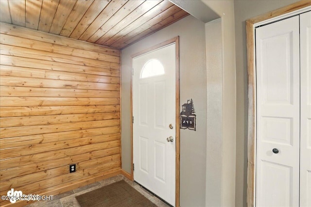 5680 W Birch Harbor Dr, Wasilla, AK 99623 - doorway featuring wood ceiling and wood walls