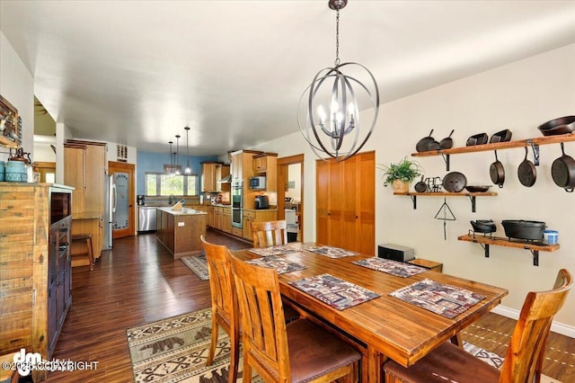 6325 S Hayfield Rd, Wasilla, AK 99654 - dining space featuring a chandelier and dark wood-type flooring