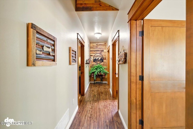 6325 S Hayfield Rd, Wasilla, AK 99654 - hallway featuring dark wood-type flooring and baseboards