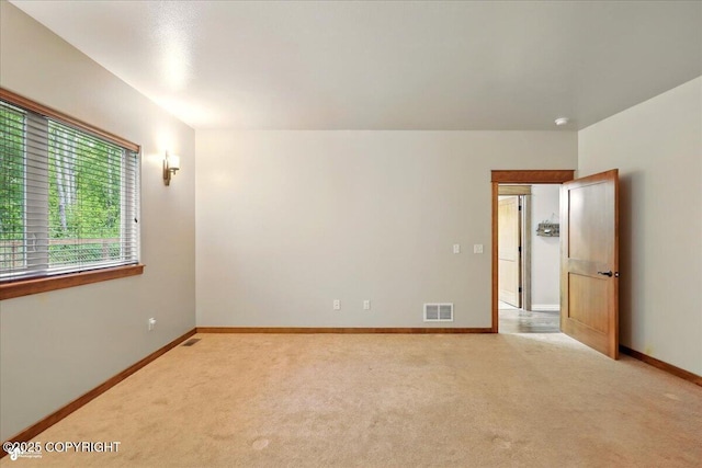 6325 S Hayfield Rd, Wasilla, AK 99654 - unfurnished room with light carpet and baseboards