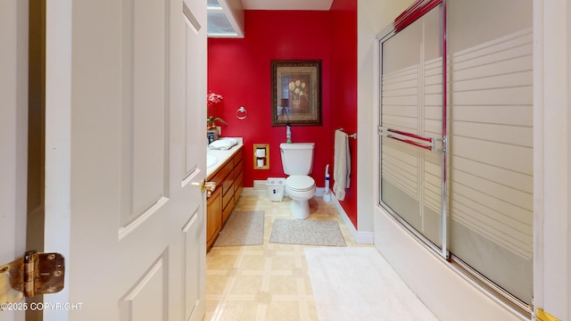 22 Sing Lee Aly # 5, Petersburg, AK 99833 - full bathroom with toilet, vanity, baseboards, and combined bath / shower with glass door
