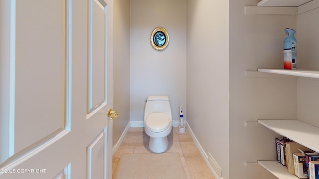 22 Sing Lee Aly # 5, Petersburg, AK 99833 - bathroom with toilet, baseboards, and tile patterned flooring
