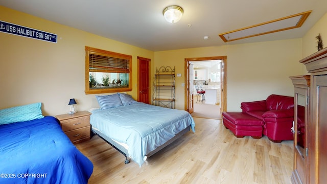 22 Sing Lee Aly # 5, Petersburg, AK 99833 - bedroom with attic access and wood finished floors