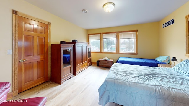 22 Sing Lee Aly # 5, Petersburg, AK 99833 - bedroom featuring light wood-type flooring