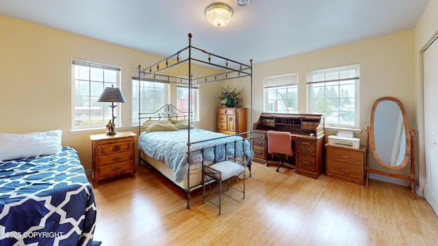 22 Sing Lee Aly # 5, Petersburg, AK 99833 - bedroom with light wood finished floors, baseboards, and a desk