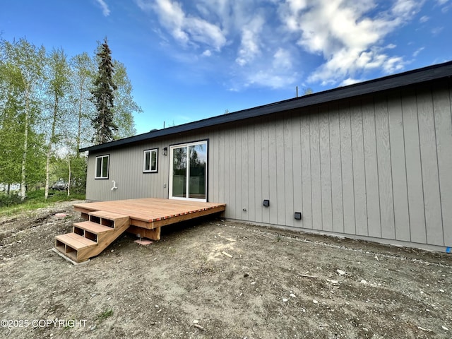 8201 W Teal Cir, Wasilla, AK 99623 - back of house featuring a wooden deck