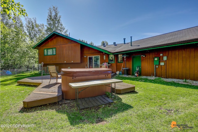 15245 Longbow Dr, Anchorage, AK 99516 - rear view of property featuring a hot tub and a wooden deck