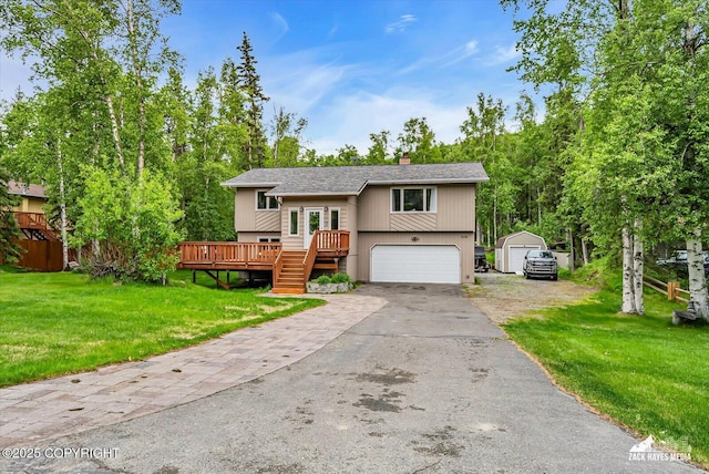19705 Citation Rd, Eagle River, AK 99577 - raised ranch featuring a chimney, a garage, a front lawn, driveway, and a wooden deck