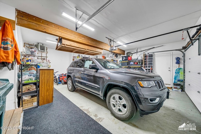 19705 Citation Rd, Eagle River, AK 99577 - garage with a garage door opener