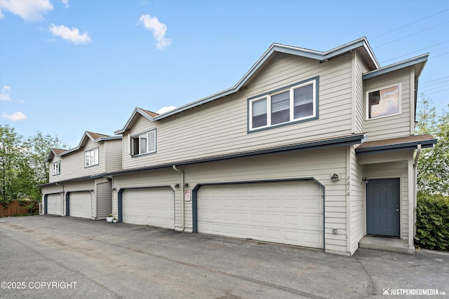 7616 Boundary Ave, Anchorage, AK 99504 - view of front of home with an attached garage