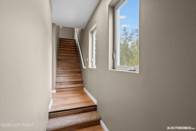 7616 Boundary Ave, Anchorage, AK 99504 - stairway featuring baseboards and wood finished floors