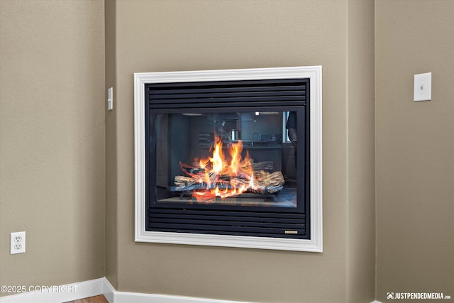 7616 Boundary Ave, Anchorage, AK 99504 - detailed view of a glass covered fireplace
