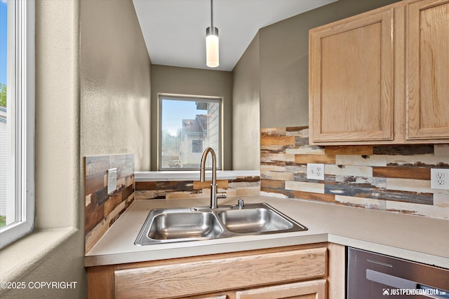 7616 Boundary Ave, Anchorage, AK 99504 - kitchen with a sink, light brown cabinets, dishwasher, and light countertops