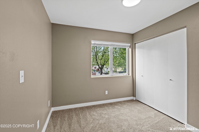 7616 Boundary Ave, Anchorage, AK 99504 - unfurnished bedroom featuring carpet flooring, baseboards, and a closet