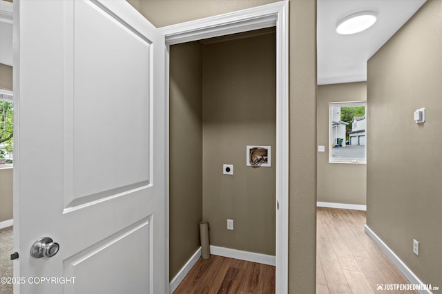 7616 Boundary Ave, Anchorage, AK 99504 - laundry area with hookup for an electric dryer, hookup for a washing machine, wood finished floors, and baseboards