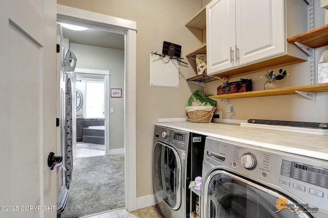 5844 E Fetlock Dr, Wasilla, AK 99654 - laundry area featuring cabinet space, washing machine and dryer, and baseboards