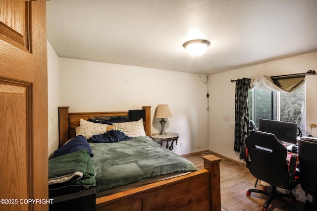 3535 S Robert Lile Cir, Palmer, AK 99645 - bedroom featuring wood finished floors and an office area