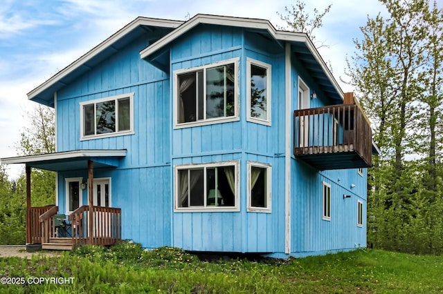 3535 S Robert Lile Cir, Palmer, AK 99645 - back of house featuring a balcony