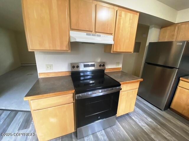 3301 Pussywillow St, Anchorage, AK 99504 - kitchen featuring stainless steel appliances, under cabinet range hood, dark wood-style floors, light brown cabinets, and dark countertops