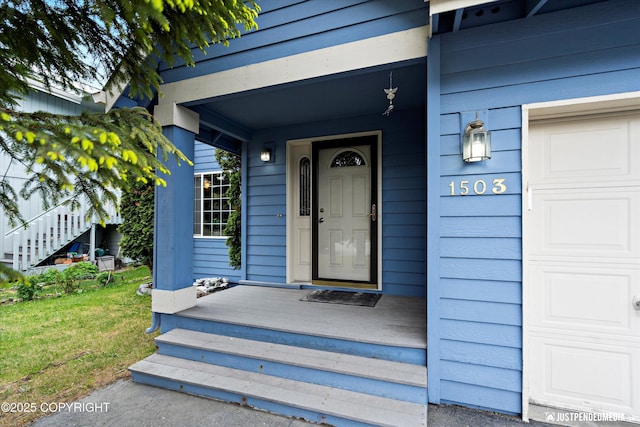 1503 N Heather Meadows Loop Unit 54, Anchorage, AK 99507 - property entrance featuring covered porch and a yard