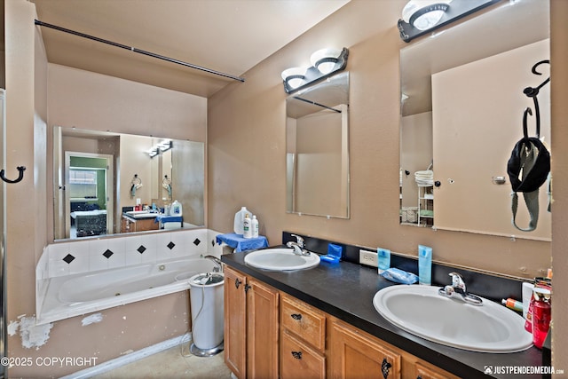 1503 N Heather Meadows Loop Unit 54, Anchorage, AK 99507 - bathroom featuring a whirlpool tub and double vanity