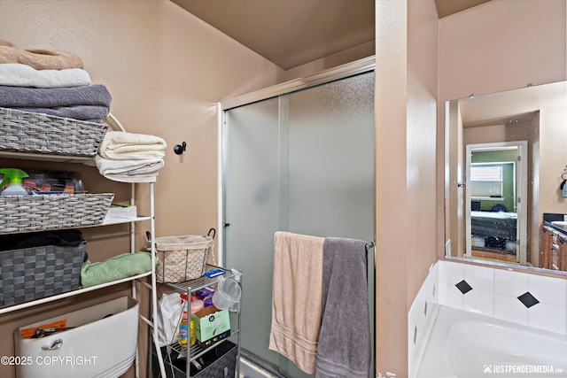1503 N Heather Meadows Loop Unit 54, Anchorage, AK 99507 - bathroom with a stall shower, a garden tub, and toilet
