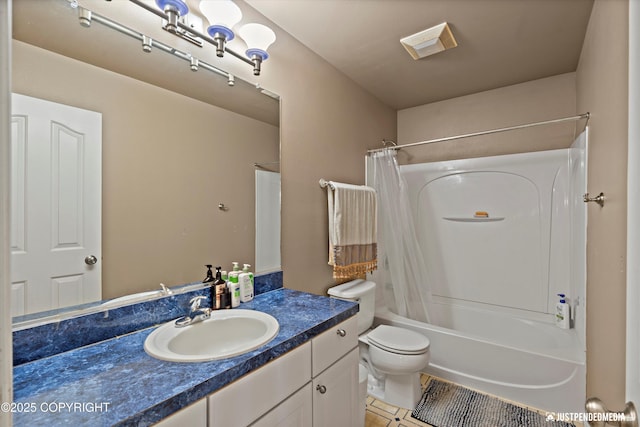 1503 N Heather Meadows Loop Unit 54, Anchorage, AK 99507 - bathroom featuring vanity, toilet, shower / tub combo, and tile patterned flooring