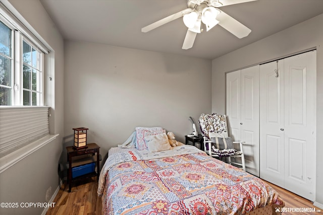 1503 N Heather Meadows Loop Unit 54, Anchorage, AK 99507 - bedroom featuring wood finished floors, a closet, and a ceiling fan