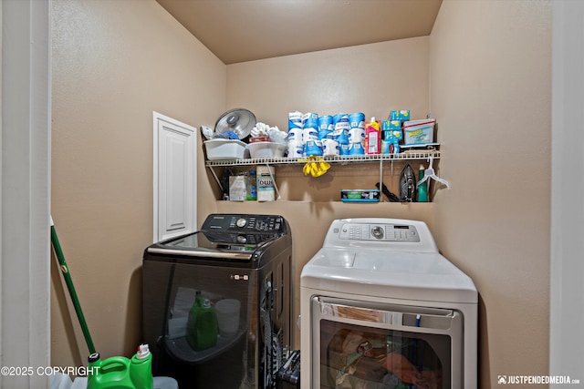1503 N Heather Meadows Loop Unit 54, Anchorage, AK 99507 - laundry room featuring washer and clothes dryer