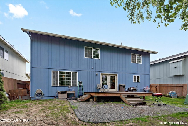 1503 N Heather Meadows Loop Unit 54, Anchorage, AK 99507 - rear view of property with a wooden deck