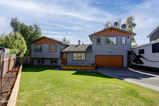 4665 Cascade Cir, Anchorage, AK 99502 - split level home with a garage and driveway