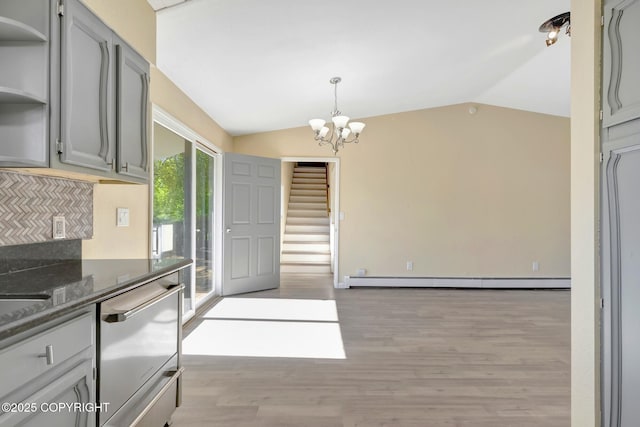 4665 Cascade Cir, Anchorage, AK 99502 - kitchen featuring dishwasher, lofted ceiling, a baseboard radiator, open shelves, and light wood-style flooring
