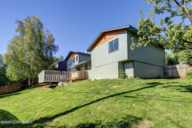 4665 Cascade Cir, Anchorage, AK 99502 - back of property with a deck