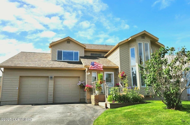 10410 Constitution St, Anchorage, AK 99515 - view of front of home featuring asphalt driveway, an attached garage, a front lawn, and a shingled roof