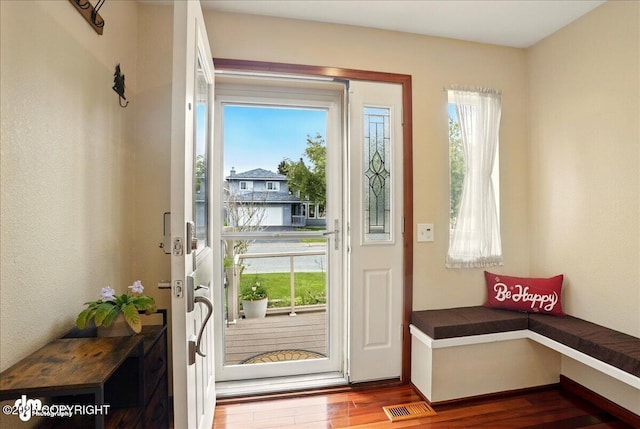 10410 Constitution St, Anchorage, AK 99515 - doorway featuring wood finished floors
