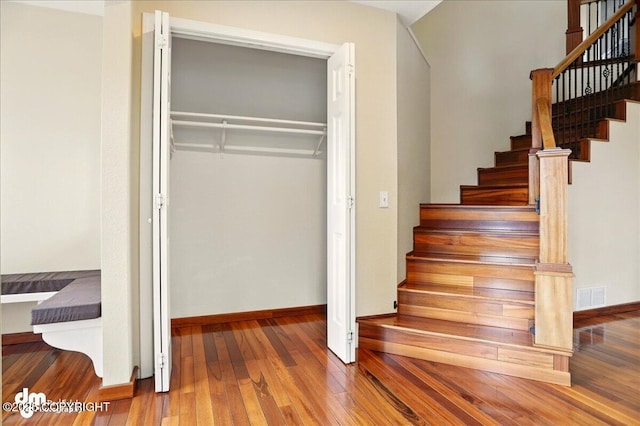 10410 Constitution St, Anchorage, AK 99515 - staircase with baseboards and wood finished floors