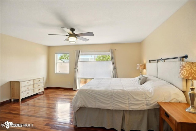 10410 Constitution St, Anchorage, AK 99515 - bedroom featuring wood-type flooring, ceiling fan, and baseboards