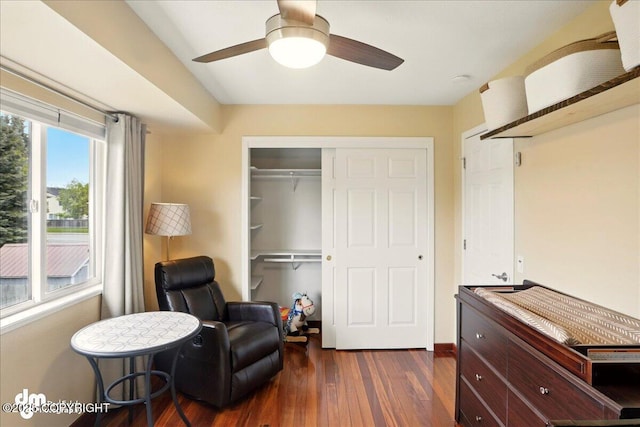 10410 Constitution St, Anchorage, AK 99515 - sitting room with dark wood-style floors and a ceiling fan