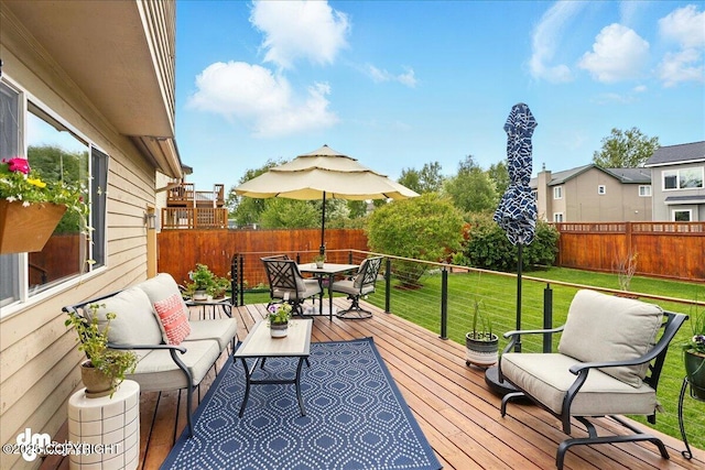 10410 Constitution St, Anchorage, AK 99515 - wooden terrace featuring outdoor dining area and an outdoor living space