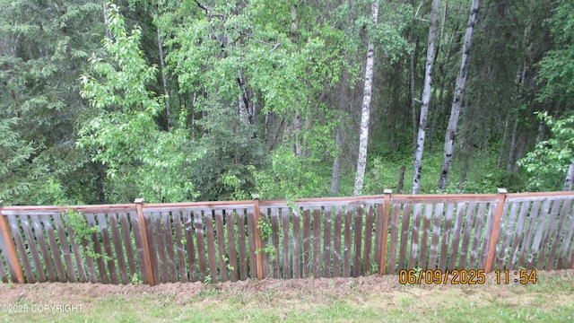 20638 Driftwood Bay Dr, Eagle River, AK 99577 - view of yard featuring a view of trees