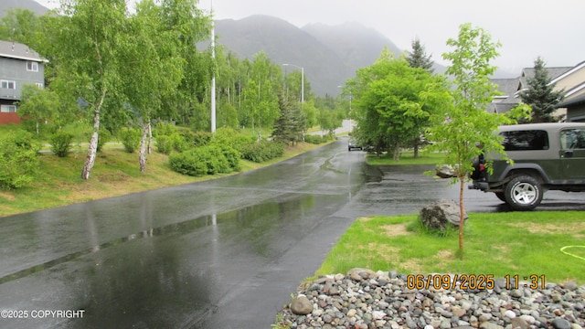 20638 Driftwood Bay Dr, Eagle River, AK 99577 - view of road featuring a mountain view