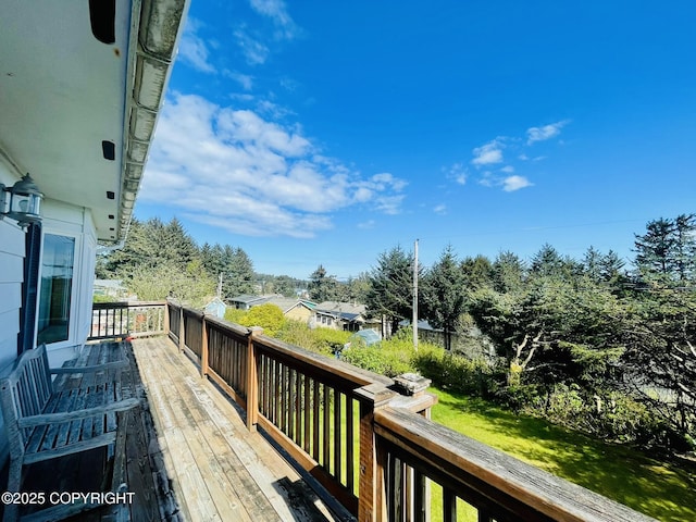 1310 Madsen Ave, Kodiak, AK 99615 - deck with a yard and view of wooded area