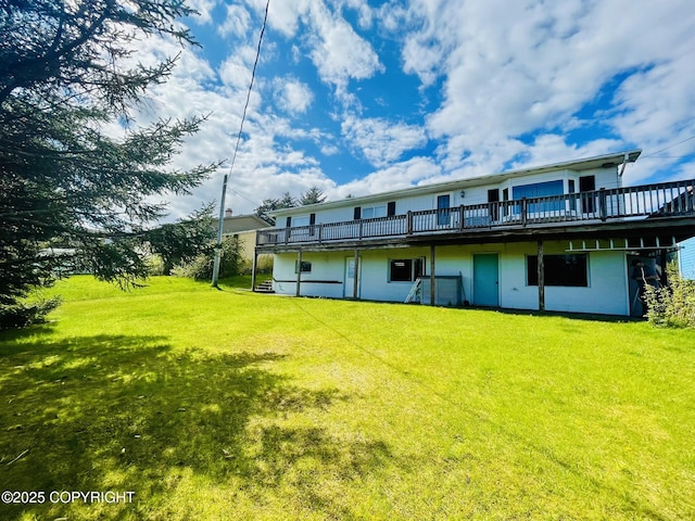 1310 Madsen Ave, Kodiak, AK 99615 - rear view of property with a wooden deck and a yard