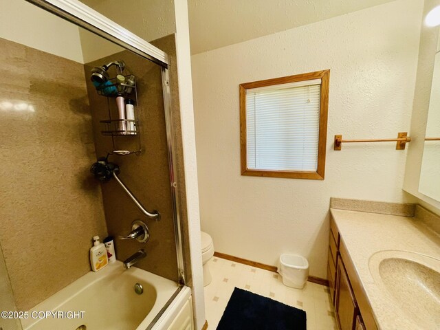 1310 Madsen Ave, Kodiak, AK 99615 - full bathroom with vanity, bathtub / shower combination, tile patterned floors, toilet, and baseboards